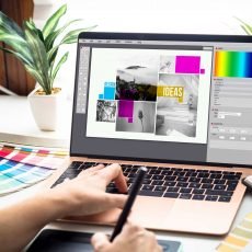 Graphic designer woman working on a laptop